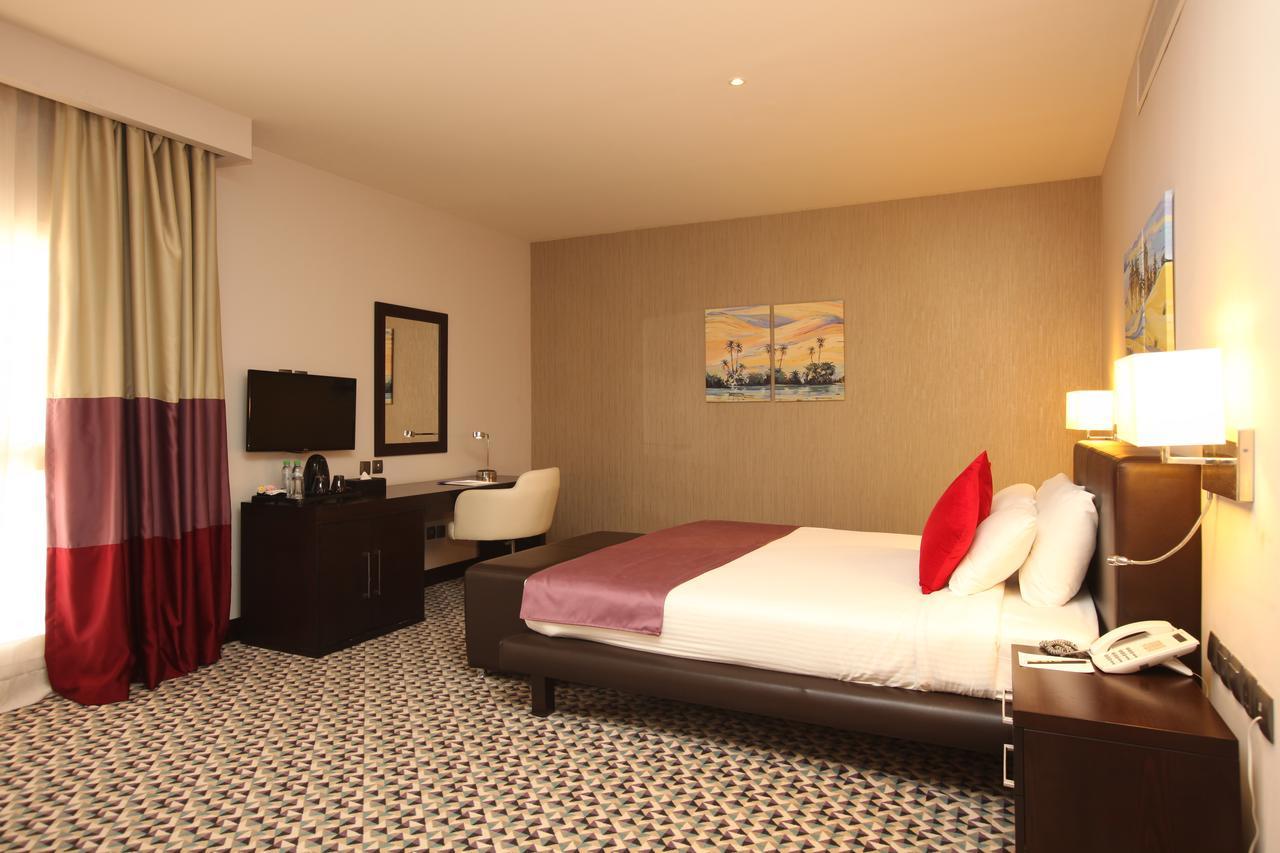 Golden Tulip Hail Экстерьер фото